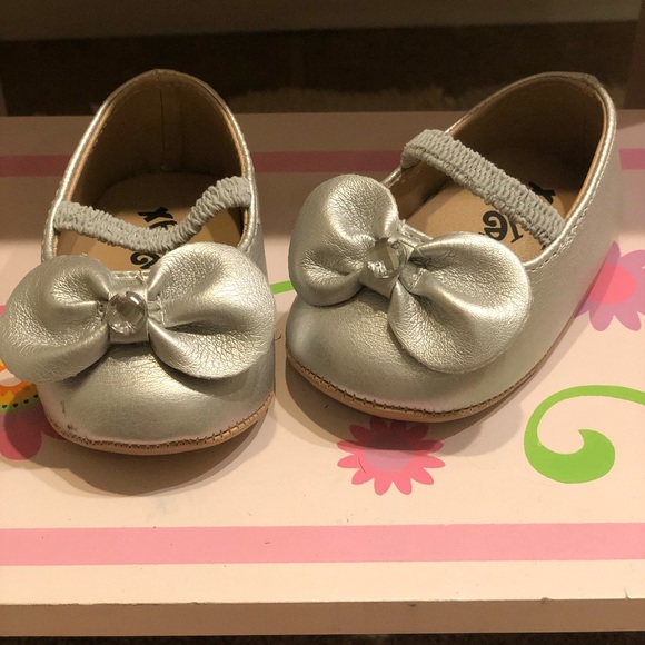silver baby shoes